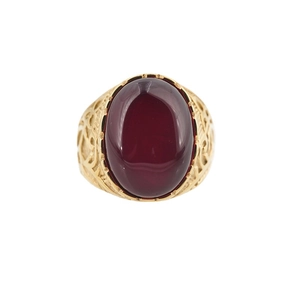 Vintage titanium steel ring with a large oval red ruby gemstone and hollow pattern