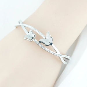 Gepolijste titaniumstalen vlinderarmband met zirkonia kristallen voor dames om pols