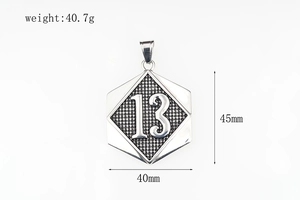 Detailed view of heavy silver number 13 pendant with grid texture and 45mm dimensions