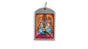 Detailed view of vintage Ganesha pendant in silver-tone metal with colorful artwork