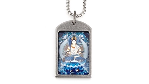 Macro shot of silver retro Thangka pendant with colorful Buddhist deity painting