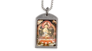 Macro shot of silver titanium steel necklace featuring Thangka Buddha design and bead chain