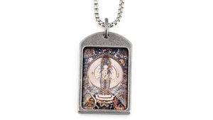 Detailed view of vintage Buddhist deity pendant with intricate colorful Thangka artwork