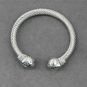 Punk style silver twisted cable open cuff bracelet with vintage embossed end caps