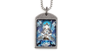 Close-up of vintage titanium steel zodiac pendant with a vivid blue Buddha image