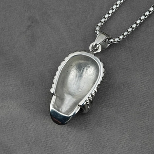 Punk style silver skull pendant in stainless steel with hollow back and box chain necklace