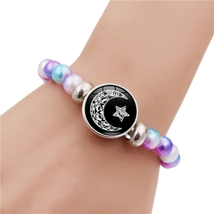 Luminous sun and moon beaded bracelet for couples featuring colorful iridescent beads