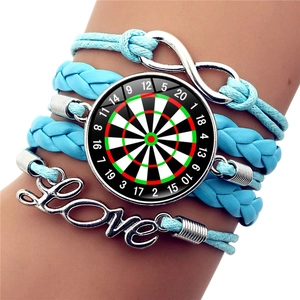 Detailed macro view of multi-layer woven bracelet with infinity symbol and love charm