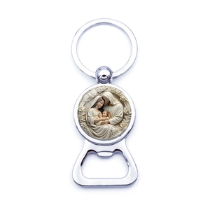 Silver metal keychain bottle opener with Holy Family religious relief engraving