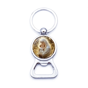 Detailed view of silver metal beer bottle opener keychain with Virgin Mary religious icon