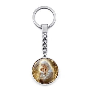 Detailed view of silver religious keychain featuring Virgin Mary and baby Jesus pendant