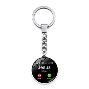 Detailed close-up of a silver round keychain pendant with a Jesus Calling phone interface