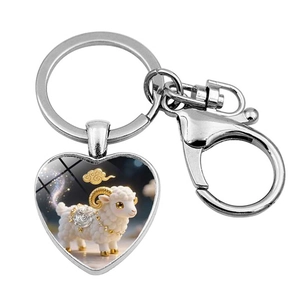 Macro shot of silver heart pendant keychain with cute white sheep and starry sky