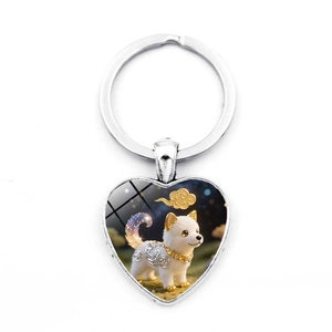 Silver heart-shaped keychain with cute white puppy and golden cloud illustration detail