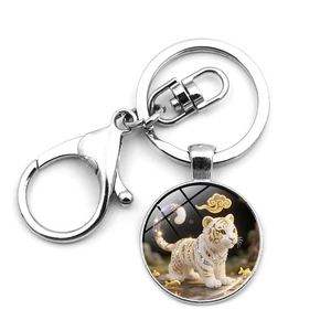 Silver metal keychain with lobster clasp featuring a white tiger zodiac charm