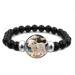 Bracelet élastique en perles noires avec pendentif en verre zodiaque bœuf et métal