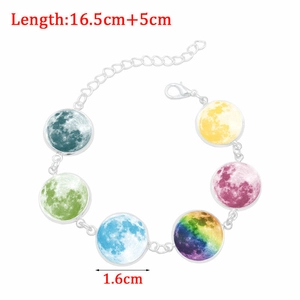 Luminous moon and galaxy themed bracelet with silver finish and colorful planet charms