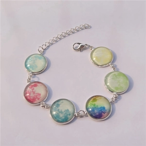 Luminous moon galaxy glass bracelet in silver finish with colorful nebula pendants for women