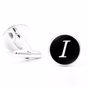 Polished silver cufflinks featuring a modern black disc with white letter I