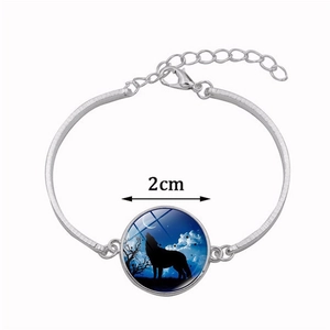 Silver wolf and moon glass pendant bracelet with adjustable chain and lobster clasp
