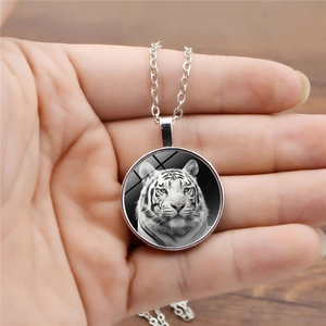 Luminous glowing white tiger time gem glass necklace with silver metal chain pendant