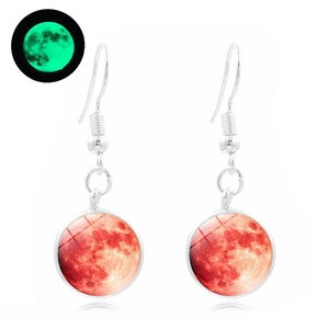Detailed view of luminous glowing galaxy moon earrings with red planet texture design