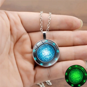 Luminous Stargate Atlantis pendant necklace with blue swirl design and green glow in dark