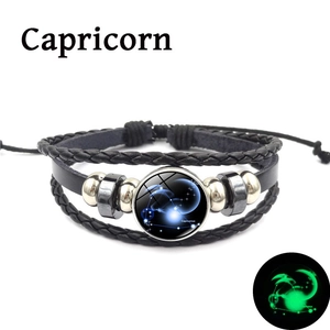 Bracelet Capricorne lumineux en cuir tressé multicouche avec effet brillant dans le noir
