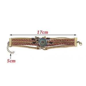 Bracelet tressé bohème multicouche avec pendentif mandala bleu et charms infini papillon