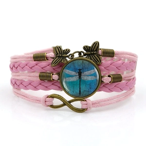 Pink multilayer braided bracelet with dragonfly glass cabochon and infinity charm
