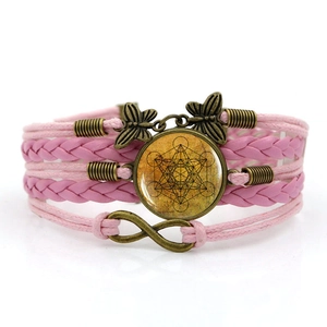 Pink Metatron's Cube multi-layer woven bracelet with bronze butterfly and infinity charms