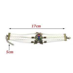 Detail of vintage braided leather bracelet with Egyptian scarab charm and 17cm length label
