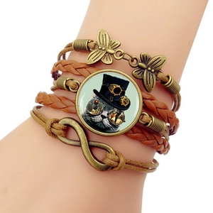 Steampunk multilayer leather bracelet with infinity charm, butterfly and cat glass cabochon