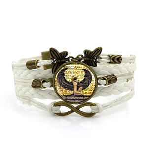 Multilayer white braided leather bracelet featuring vintage Egyptian Cleopatra gemstone and bronze charms