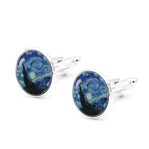 Macro shot of Van Gogh's Starry Night cufflinks with polished silver T-bar closure