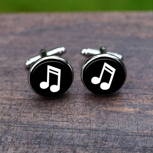 Men's polished round cufflinks with white sixteenth music note pattern on black background