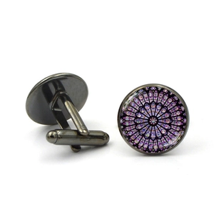 Detail view of Gothic rose window pattern on gunmetal cufflinks for men's suits