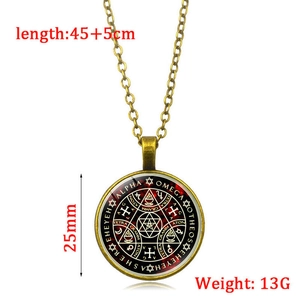 Vintage bronze alloy necklace with a glass Tree of Life pendant and mystic symbols