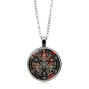Silver Tree of Life necklace with red mystical symbol glass pendant on white background