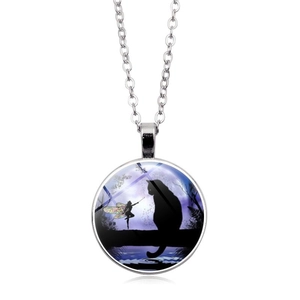 Detail of round glass pendant with black cat and fairy silhouette on a purple galaxy sky