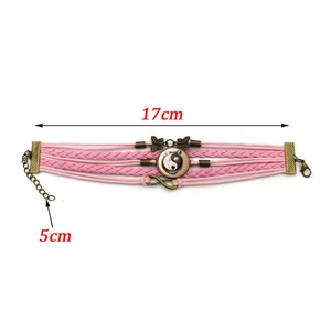 Bracelet en cuir tressé rose avec pendentif loup, breloque papillon et symbole de l'infini