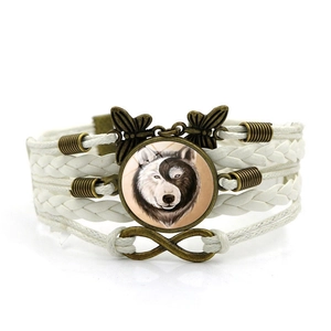 Bracelet multicouche en cuir tressé avec cabochon loup Yin Yang et breloque papillon
