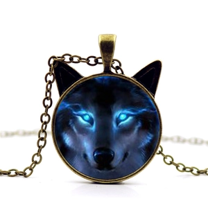 Wolf head pendant necklace in bronze with glass gem and cat ear frame on white background