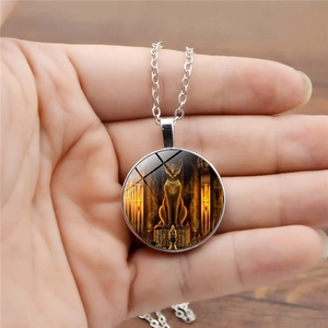 Silver long chain necklace featuring an Egyptian Cat Goddess Bastet art glass pendant
