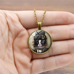 Steampunk cat necklace pendant featuring a gentleman cat in bronze vintage metal setting