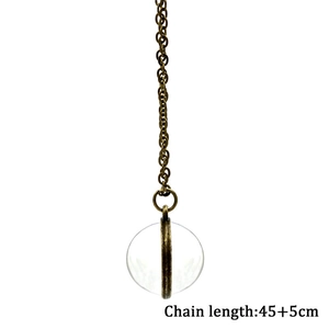 Collier vintage lune en bronze avec orbe en verre et motif galaxie sur chaîne de 45cm