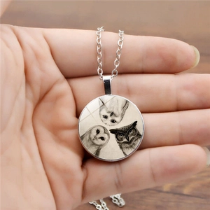 Antique silver owl pendant necklace featuring three owls glass cabochon art design
