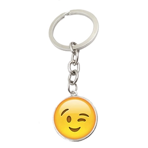 Detail of wink emoji glass pendant keychain with polished silver metal link chain