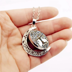 Rotating Tree of Life moon pendant necklace in silver stainless steel finish