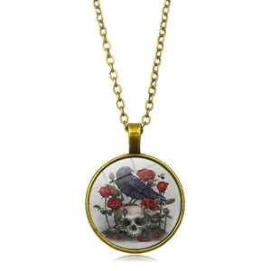 Vintage gothic bronze pendant necklace featuring crow, skull and red roses artwork
